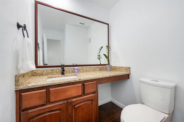3227 Elizabeth St, Dallas, TX 75204 - bathroom featuring vanity and wood finished floors