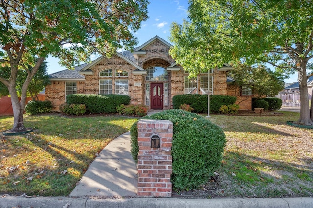 6705 Rolling Hills Dr, North Richland Hills, TX 76182 - traditional home featuring brick siding and a front yard