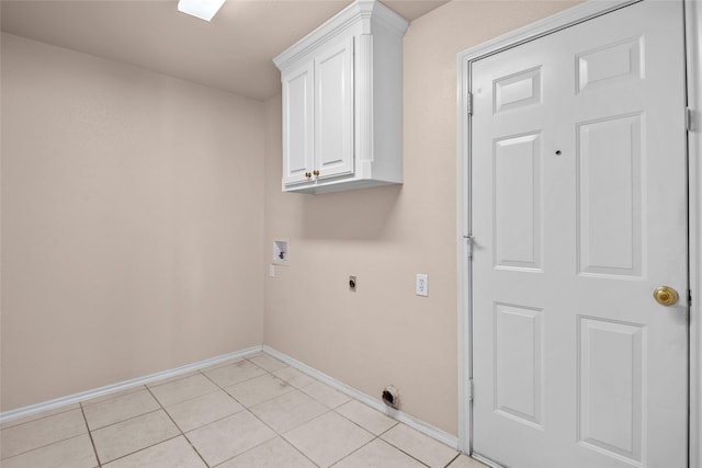 6705 Rolling Hills Dr, North Richland Hills, TX 76182 - laundry area with electric dryer hookup, baseboards, hookup for a washing machine, cabinet space, and light tile patterned floors