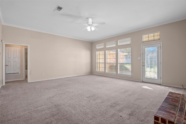 6705 Rolling Hills Dr, North Richland Hills, TX 76182 - empty room featuring ceiling fan, ornamental molding, carpet floors, and baseboards