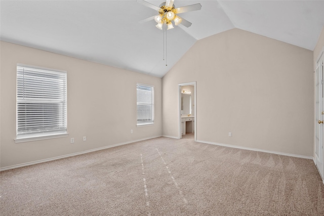 6705 Rolling Hills Dr, North Richland Hills, TX 76182 - unfurnished bedroom featuring vaulted ceiling, light carpet, baseboards, ceiling fan, and connected bathroom