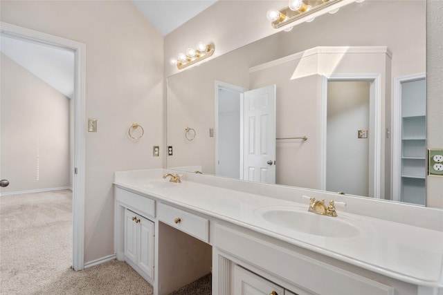 6705 Rolling Hills Dr, North Richland Hills, TX 76182 - full bathroom featuring double vanity and vaulted ceiling