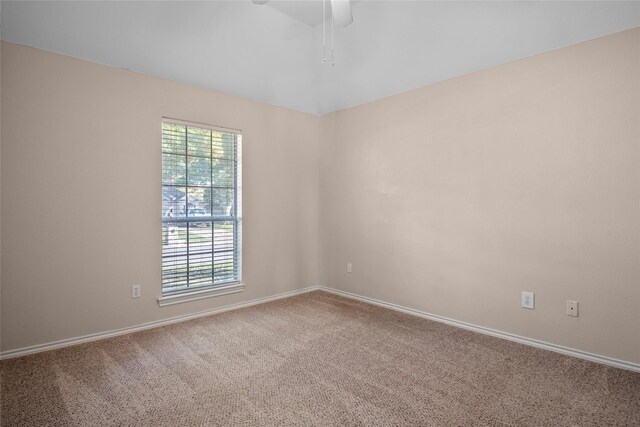 6705 Rolling Hills Dr, North Richland Hills, TX 76182 - spare room with carpet, baseboards, and ceiling fan