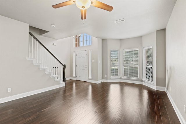 313 Wallford Ln, Lake Dallas, TX 75065 - foyer entrance featuring stairs, wood finished floors, a ceiling fan, and baseboards
