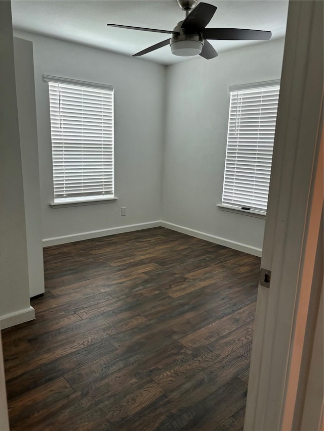 177 Lcr 613 Rd, Groesbeck, TX 76642 - empty room featuring dark wood-type flooring, ceiling fan, and baseboards