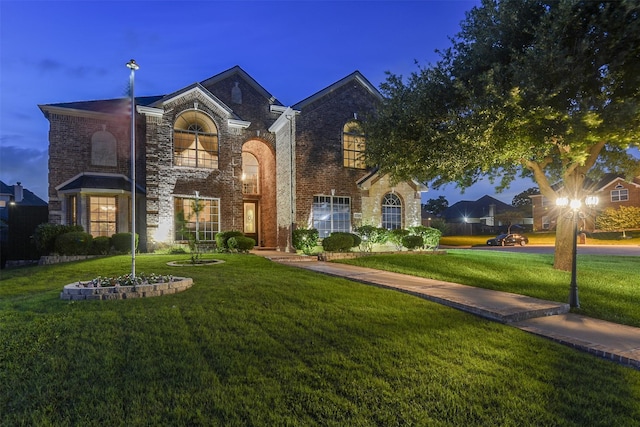 2724 Ferncrest Trl, Mansfield, TX 76063 - traditional home featuring a front yard, brick siding, and stone siding