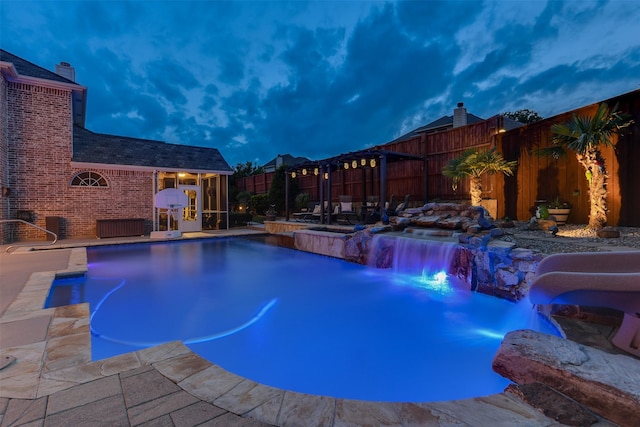 2724 Ferncrest Trl, Mansfield, TX 76063 - view of swimming pool featuring a fenced backyard, a water slide, and a hot tub