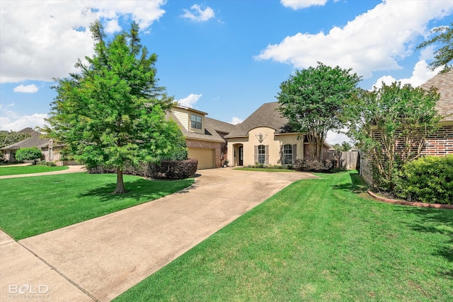 9961 Loveland Ct, Shreveport, LA 71106 - french country style house with an attached garage and driveway