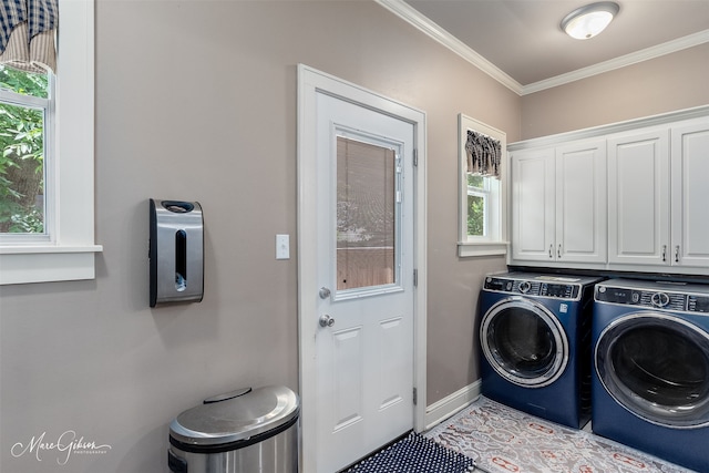1321 Anniston Ave, Shreveport, LA 71105 - laundry room featuring washing machine and clothes dryer, cabinet space, ornamental molding, and baseboards
