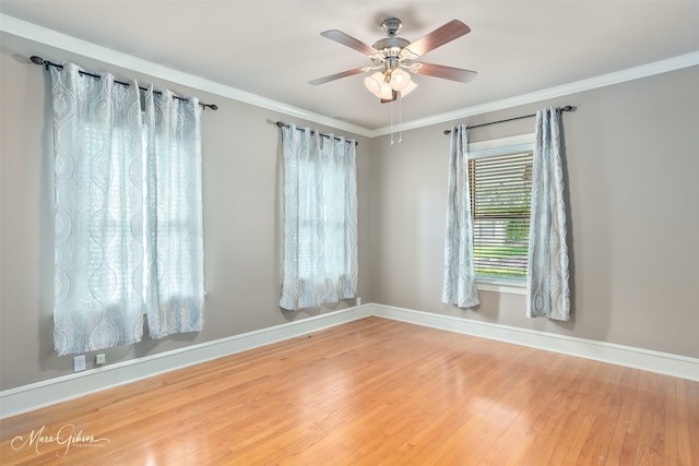 1321 Anniston Ave, Shreveport, LA 71105 - spare room featuring wood finished floors, baseboards, a ceiling fan, and crown molding