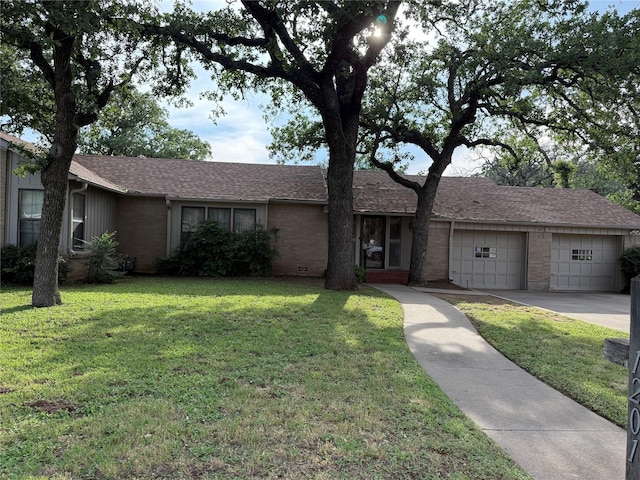 1201 NW 7th Ave, Mineral Wells, TX 76067 - single story home with a garage, concrete driveway, a front yard, and brick siding