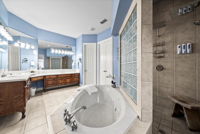 1304 Salsbury Cir, Murphy, TX 75094 - full bath featuring double vanity, a whirlpool tub, walk in shower, and tile patterned flooring