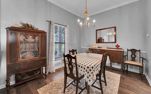 804 Heritage Pkwy, Axtell, TX 76624 - dining area featuring baseboards, a chandelier, dark wood-type flooring, and crown molding