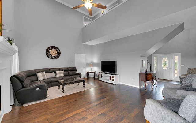 804 Heritage Pkwy, Axtell, TX 76624 - living room featuring a towering ceiling, ceiling fan, wood finished floors, and baseboards