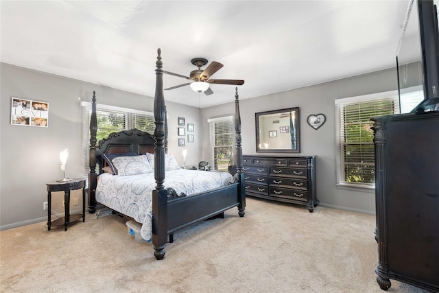 2202 Belmeade Ave, Brownwood, TX 76801 - carpeted bedroom with multiple windows, baseboards, and a ceiling fan