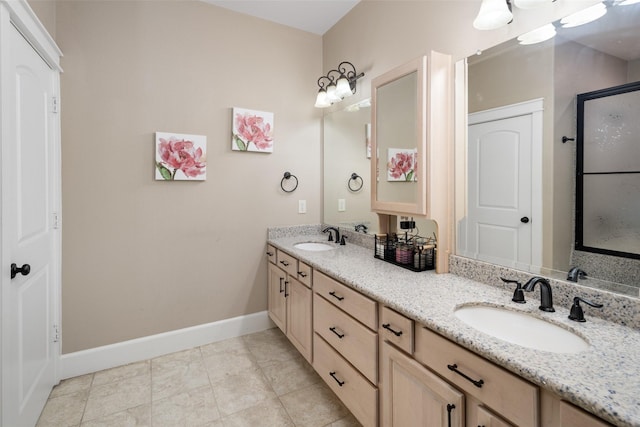 1814 Stacy Rd, Fairview, TX 75069 - bathroom featuring baseboards, double vanity, a stall shower, and tile patterned flooring
