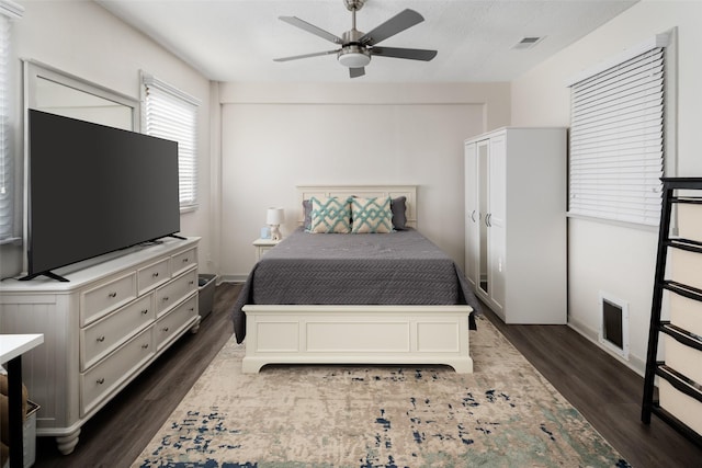 1814 Stacy Rd, Fairview, TX 75069 - bedroom featuring dark wood finished floors, ceiling fan, and baseboards