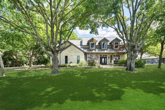 1814 Stacy Rd, Fairview, TX 75069 - view of front of house with a standing seam roof, a front yard, metal roof, and stone siding