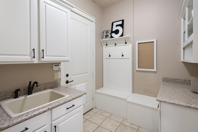 1814 Stacy Rd, Fairview, TX 75069 - washroom featuring a sink and light tile patterned floors