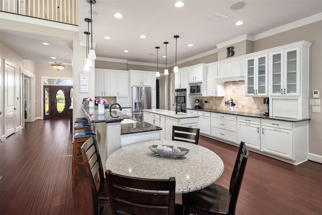 1814 Stacy Rd, Fairview, TX 75069 - dining room with crown molding, recessed lighting, baseboards, and dark wood finished floors