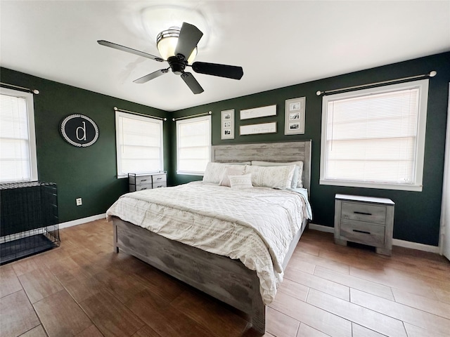 4098 Avondale St, Abilene, TX 79605 - bedroom with multiple windows and wood finish floors