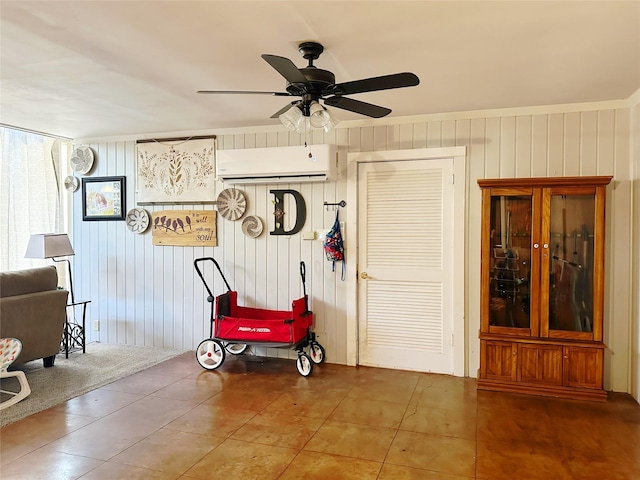 4098 Avondale St, Abilene, TX 79605 - living area with a wall mounted AC, tile patterned flooring, and ceiling fan