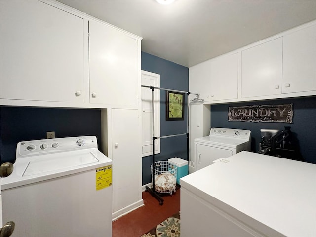4098 Avondale St, Abilene, TX 79605 - laundry area with washer and clothes dryer, cabinet space, and dark wood-type flooring