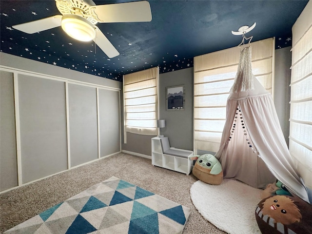 4098 Avondale St, Abilene, TX 79605 - game room with carpet floors, plenty of natural light, and a ceiling fan