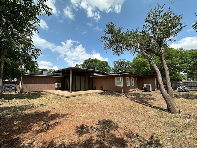 4098 Avondale St, Abilene, TX 79605 - back of house featuring central AC and a wooden deck