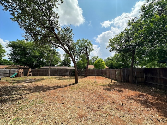 4098 Avondale St, Abilene, TX 79605 - fenced backyard with a playground