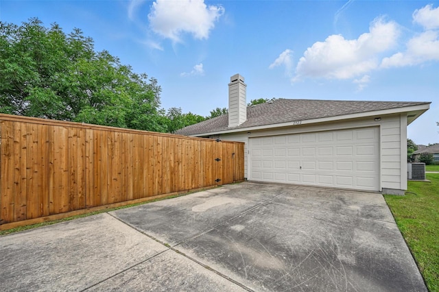 2922 Sheridan Ln, Wylie, TX 75098 - garage with concrete driveway and central AC