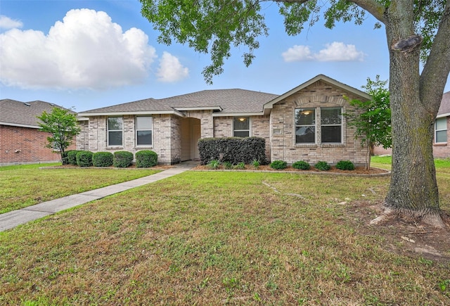 2922 Sheridan Ln, Wylie, TX 75098 - single story home with a front yard, brick siding, and a shingled roof