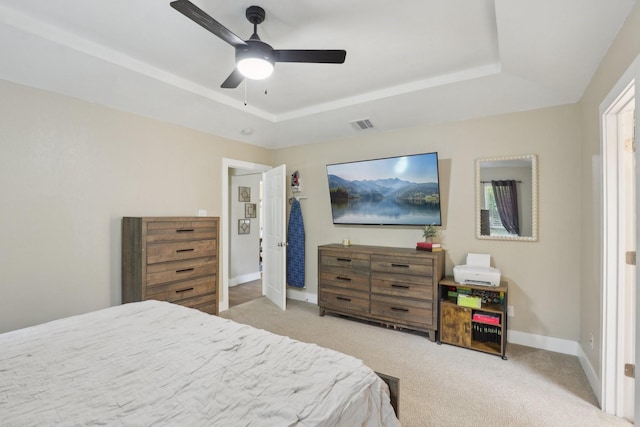 9 Chimney Rock Dr, Trophy Club, TX 76262 - carpeted bedroom featuring a raised ceiling, baseboards, and ceiling fan