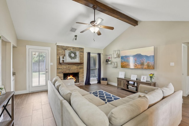 9 Chimney Rock Dr, Trophy Club, TX 76262 - living room with ceiling fan, wood finished floors, a brick fireplace, and baseboards