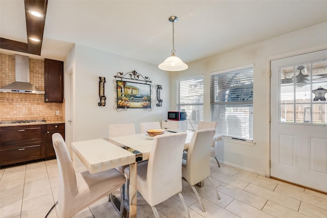 225 Redhead Dr, Little Elm, TX 75068 - dining area featuring light tile patterned flooring and baseboards