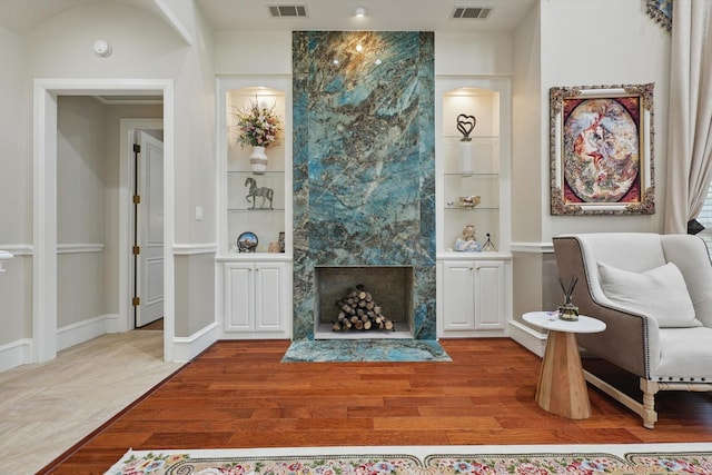 6260 Oak Hollow Dr, Burleson, TX 76028 - living area featuring built in features and wood finished floors