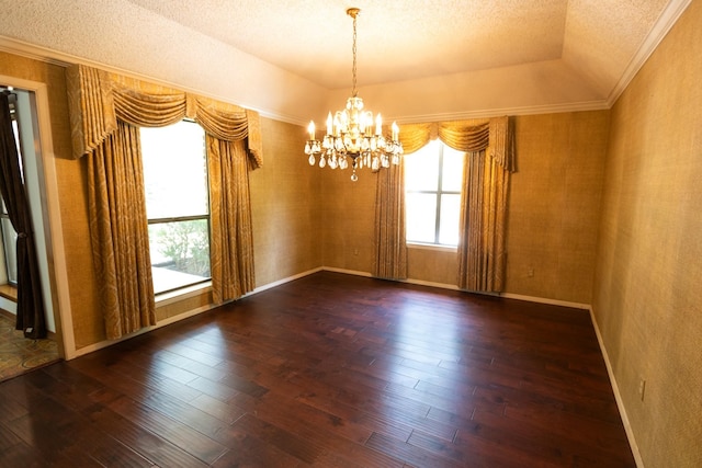 6837 Roberts Ln, Fort Worth, TX 76140 - spare room with healthy amount of natural light, a textured ceiling, hardwood / wood-style flooring, a chandelier, and ornamental molding