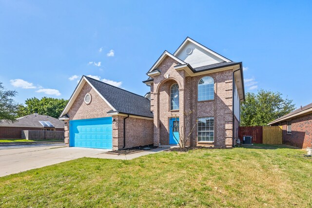 8901 Elbe Trl, Fort Worth, TX 76118 - traditional-style home with brick siding, central AC unit, an attached garage, and concrete driveway