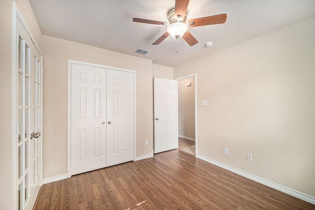 600 Swift Current Dr, Crowley, TX 76036 - unfurnished bedroom featuring wood finished floors, baseboards, a closet, and ceiling fan