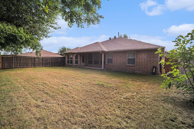 600 Swift Current Dr, Crowley, TX 76036 - rear view of house with brick siding, roof with shingles, and a patio area