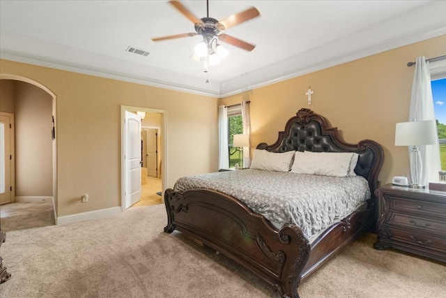 120 Trail Rdg, Weatherford, TX 76087 - bedroom with carpet, ornamental molding, arched walkways, baseboards, and ceiling fan