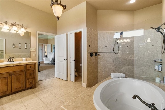 120 Trail Rdg, Weatherford, TX 76087 - bathroom with a jetted tub, vanity, walk in shower, tile patterned flooring, and toilet