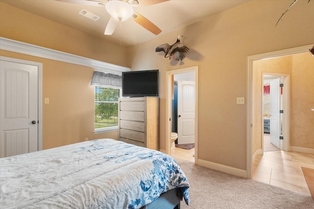 120 Trail Rdg, Weatherford, TX 76087 - bedroom featuring baseboards, light colored carpet, ensuite bath, ceiling fan, and light tile patterned floors