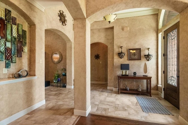 120 Trail Rdg, Weatherford, TX 76087 - foyer with arched walkways, stone tile flooring, and baseboards