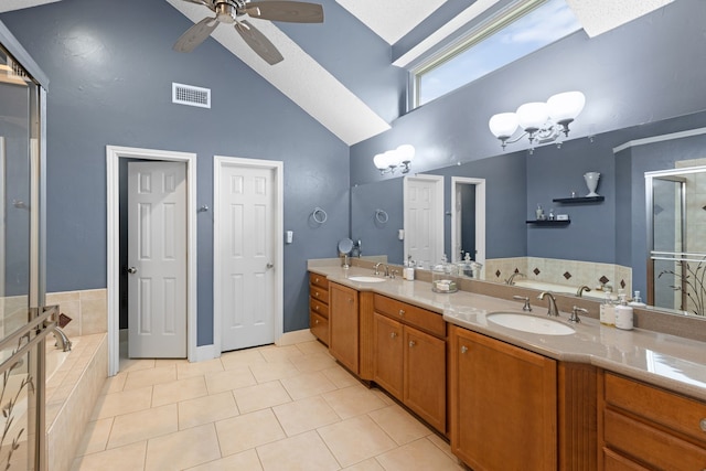 2304 Colleen Ct, Carrollton, TX 75007 - full bath featuring high vaulted ceiling, a stall shower, a garden tub, ceiling fan, and double vanity