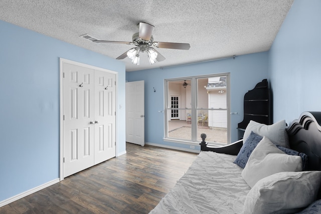 2304 Colleen Ct, Carrollton, TX 75007 - bedroom featuring wood finished floors, a ceiling fan, a textured ceiling, and a closet