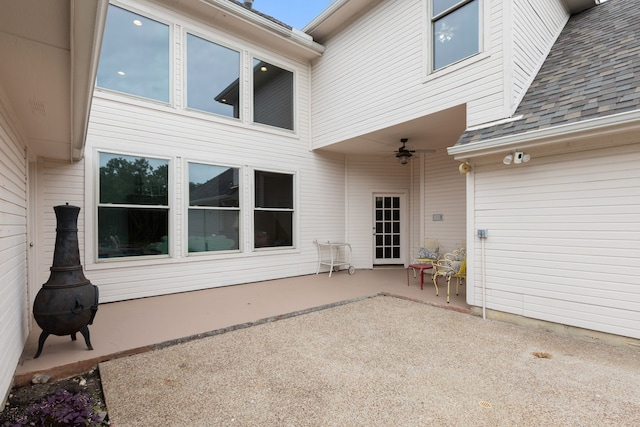 2304 Colleen Ct, Carrollton, TX 75007 - doorway to property featuring a patio area, a shingled roof, and ceiling fan