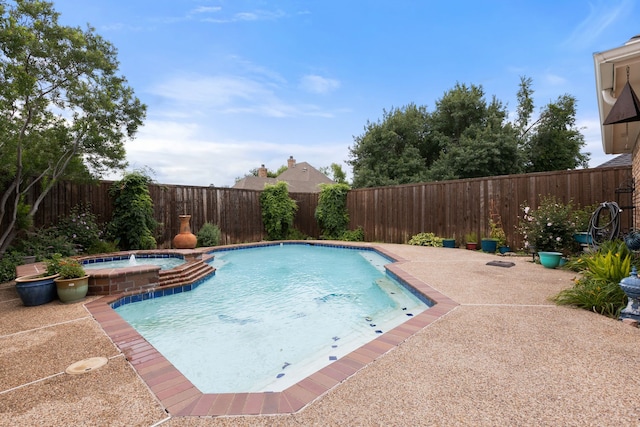 2304 Colleen Ct, Carrollton, TX 75007 - view of swimming pool with a fenced backyard, a pool with connected hot tub, and a patio area