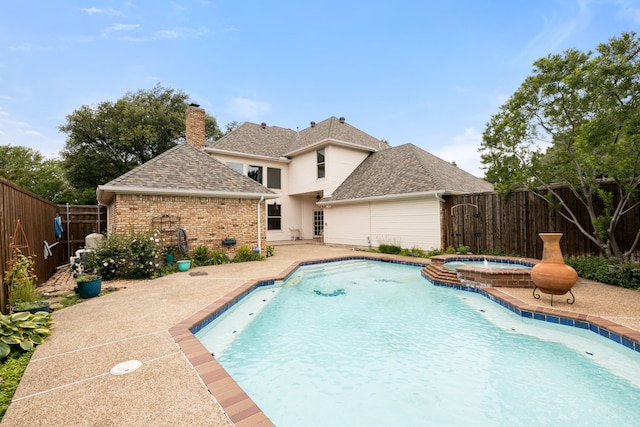 2304 Colleen Ct, Carrollton, TX 75007 - view of pool with a fenced backyard, a patio, and a pool with connected hot tub