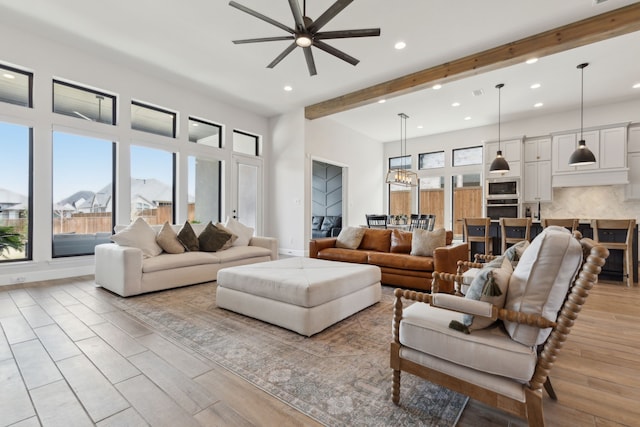 2019 Stargrass Rd, Haslet, TX 76052 - living area with ceiling fan, recessed lighting, healthy amount of natural light, beam ceiling, and wood finished floors